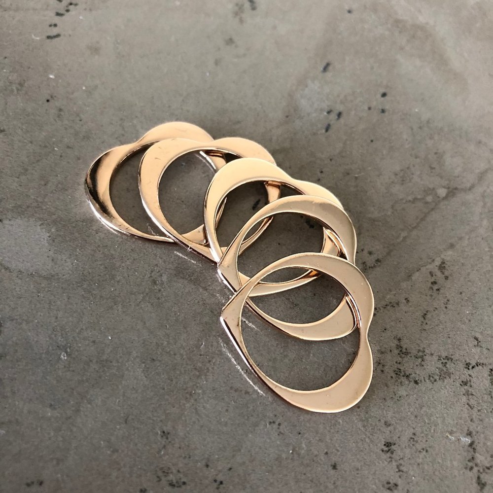 A Set of Five Heart-Shaped Stacking Rings